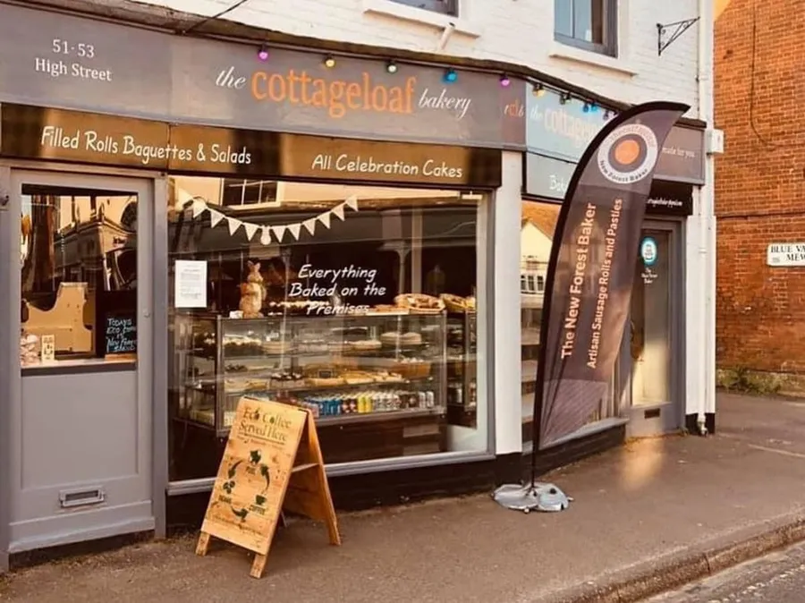 Double-fronted shop front of The Cottage Loaf on Fordingbridge High Street