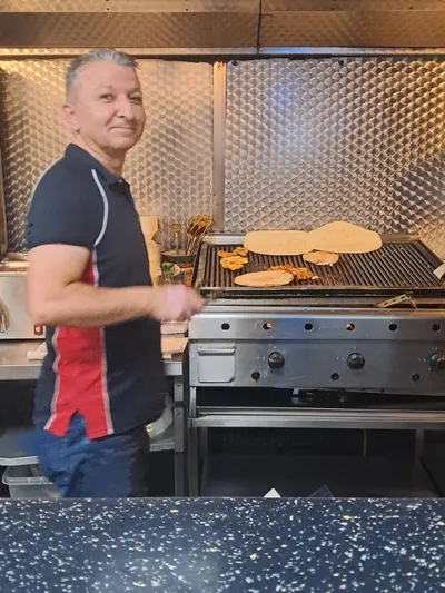 Owner at the grill