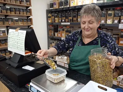 scopping ingredients from a jar