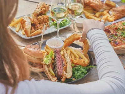 a meal of steak and battered onion rings
